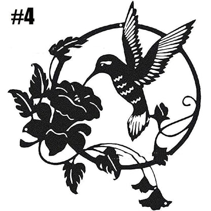 Black metal hummingbird wall art featuring detailed bird and flower design by Sheila Merchandise