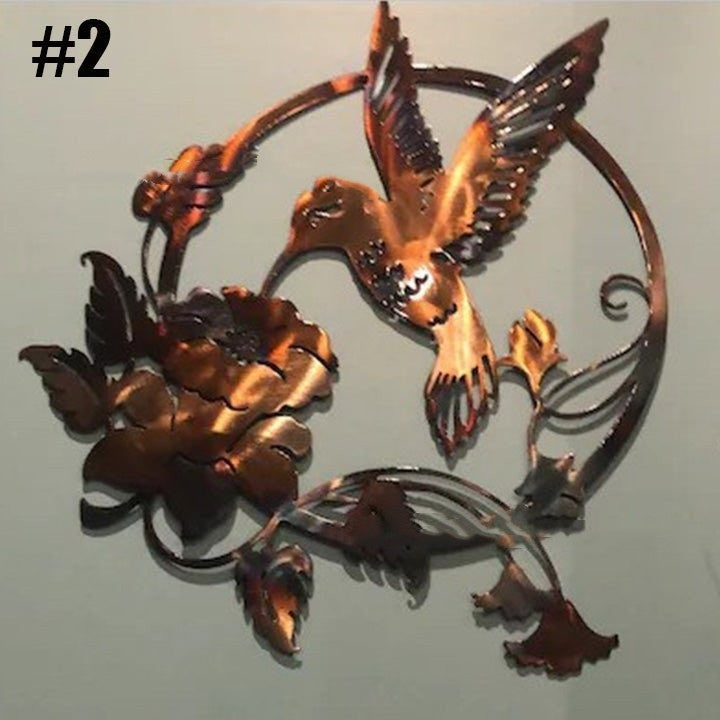 Sheila Merchandise metal hummingbird wall art with copper finish featuring a bird and floral design