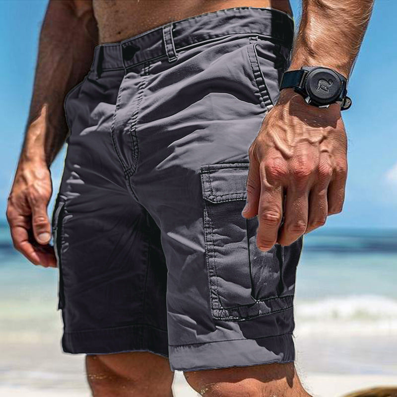 Sheila Merchandise multi pocket cargo shorts for men in gray worn at the beach with multiple side pockets