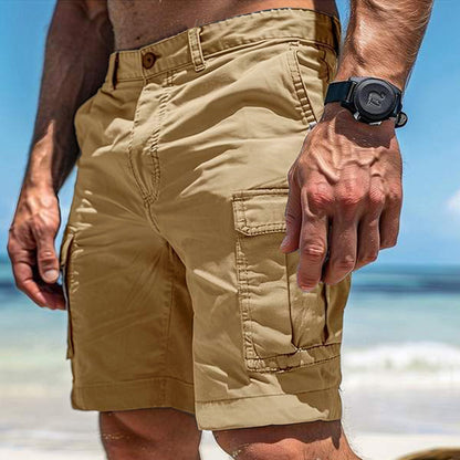Sheila Merchandise tan multi pocket cargo shorts for men worn on beach with wristwatch