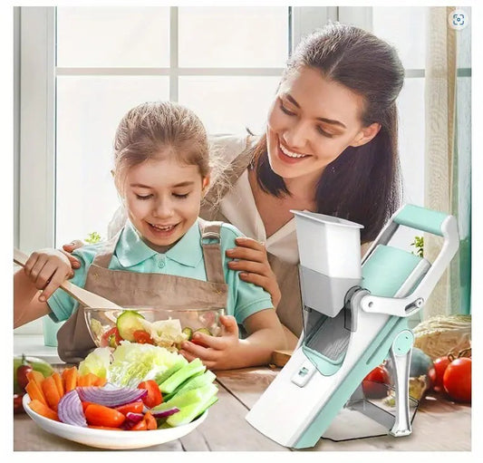 Mother and daughter using a multifunctional vegetable slicer to prepare fresh salad with colorful vegetables