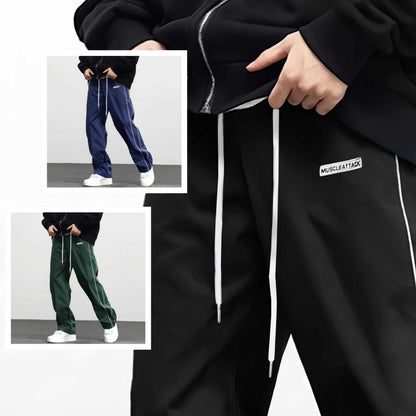 Men's comfortable jogger pants in black, blue, and green with side pockets for casual wear