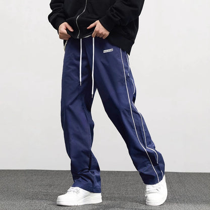 Men's comfortable jogger pants in navy blue with side pockets for casual style and comfort