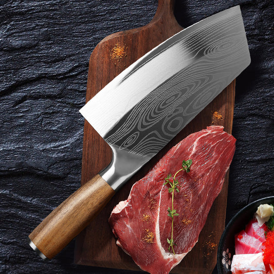 Sheila Merchandise premium stainless steel kitchen knife with wooden handle on cutting board with raw steak