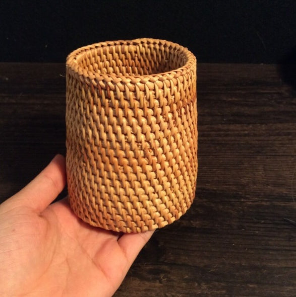 Sheila Merchandise woven storage box held in hand as a compact home office storage solution