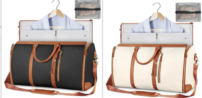 Stylish travel bag in black and white with brown leather accents and spacious interior for versatile use