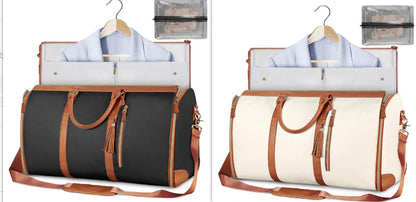 Stylish travel bag in black and white with brown leather accents and spacious interior for versatile use