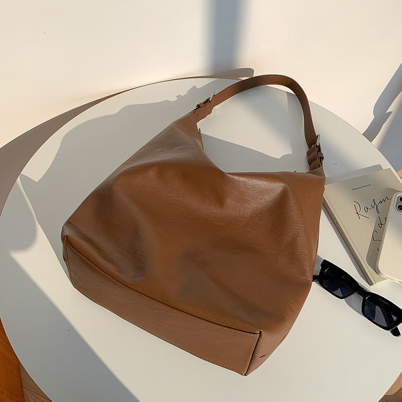 Sheila Merchandise versatile leather shoulder bag soft brown casual tote handbag on table