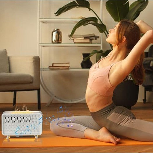White noise sleep lamp emitting soothing sounds next to woman practicing yoga at home